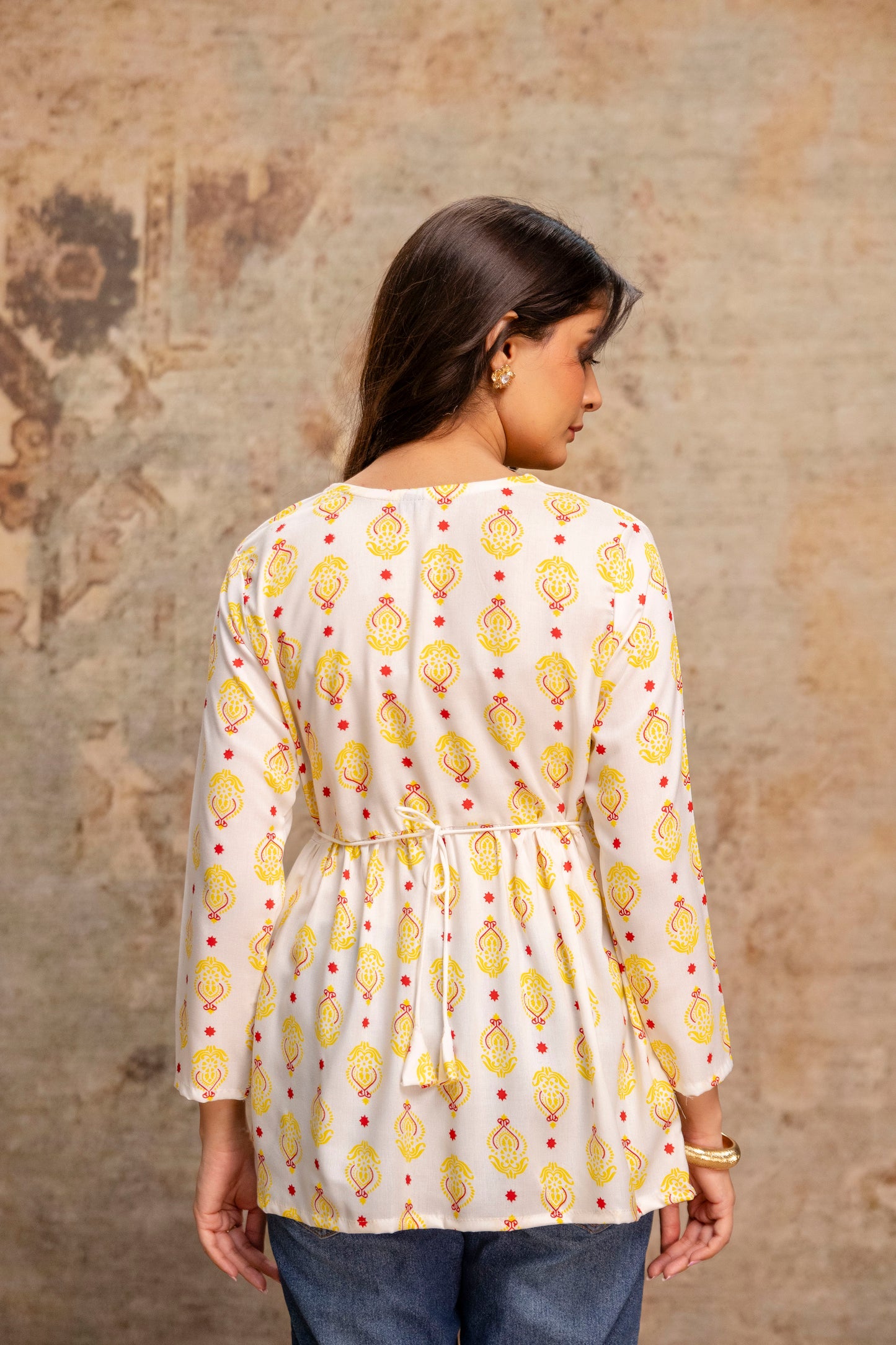 Lievva Women's White & Yellow Printed Cotton Blend Peplum Kurti Top