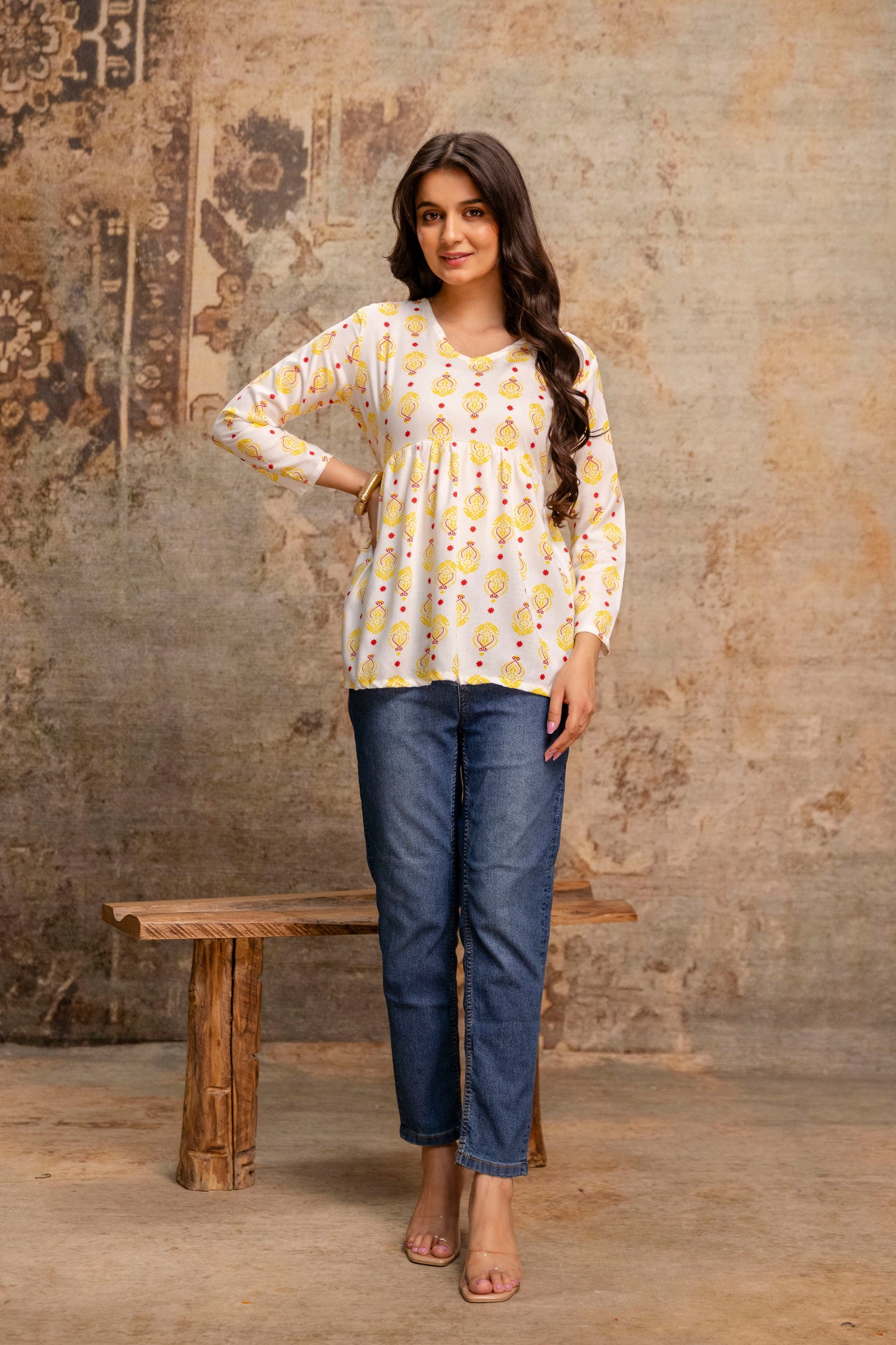 Lievva Women's White & Yellow Printed Cotton Blend Peplum Kurti Top